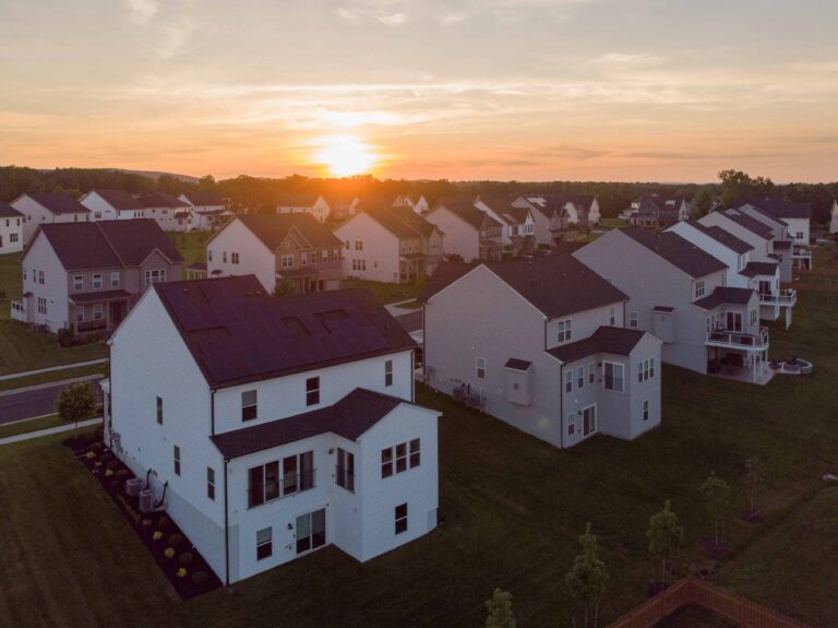 Neighborhood of single family homes with rooftop solar arrays