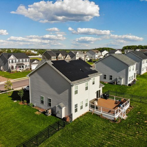 solar panel array on house in suburban developement