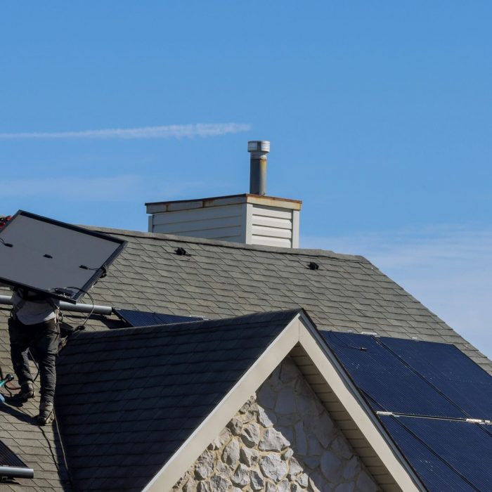 work-man-installing-photovoltaic-solar-panels-alte-2022-11-12-11-31-25-utc-scaled.jpg